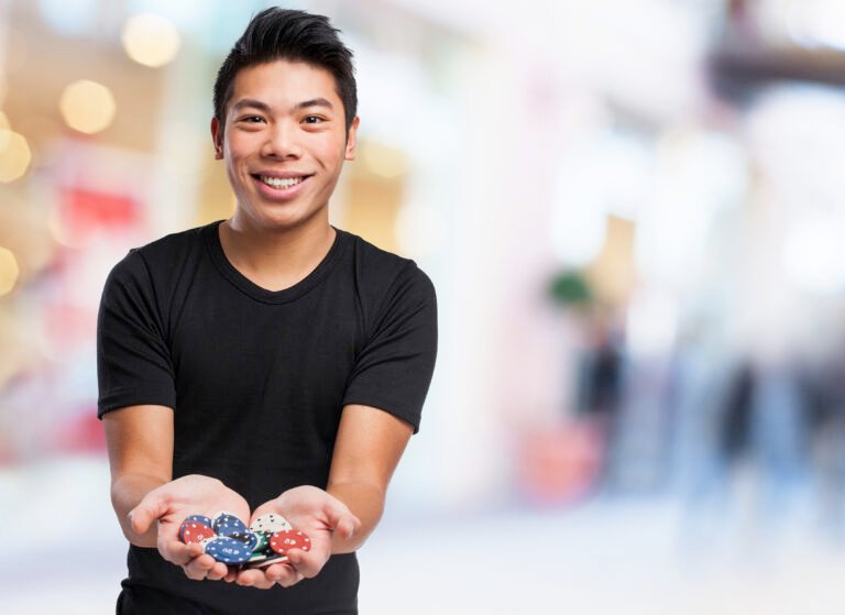 happy man with casino chips