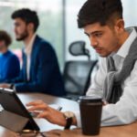 people office analyzing checking finance graphs